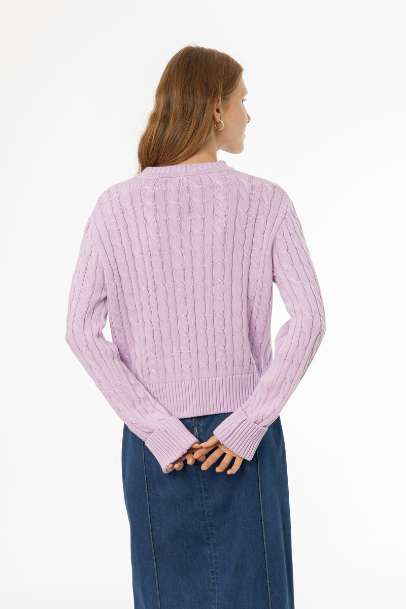 Soft lavender cable knit sweater with round neckline