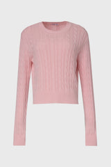 Soft pink cable knit sweater with round neckline